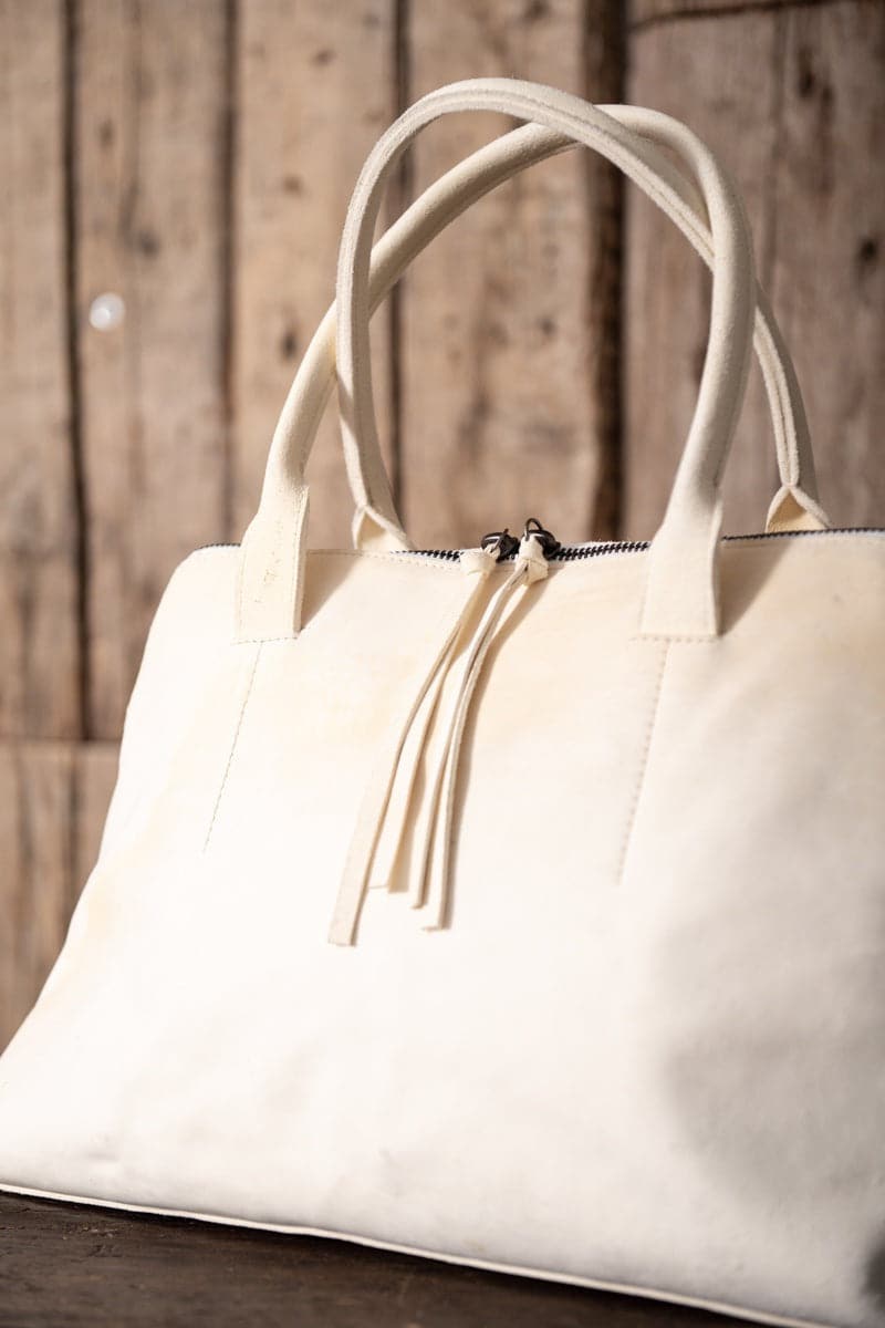 Tagliovivo | Bauletto Bag | Spezielle Tasche aus weißem Rauleder