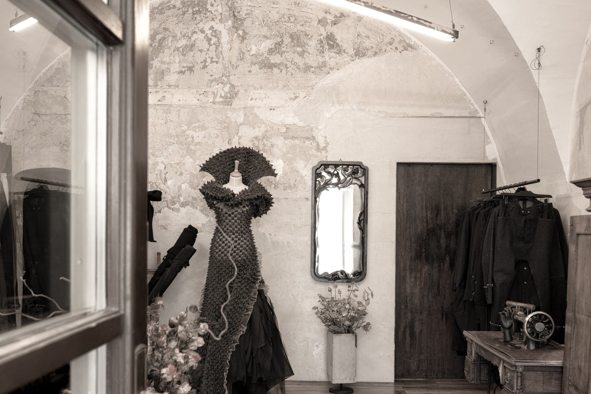 Haute couture dress at the entrance of eigensinnig wien fashion store in Vienna.
