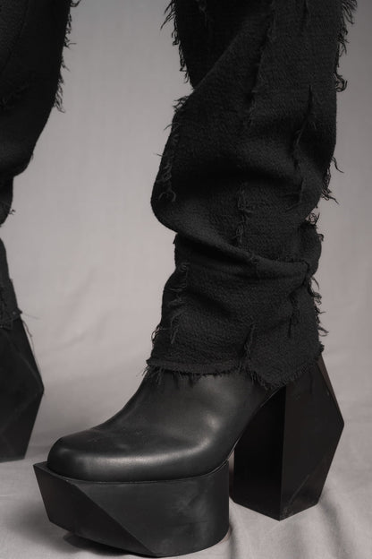 eigensinnig wien | Allegro | Sartoriale Hose mit tiefem Schritt aus Baumwolle mit roher Textur