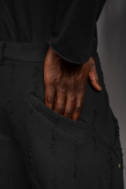 eigensinnig wien | Allegro | Sartoriale Hose mit tiefem Schritt aus Baumwolle mit roher Textur