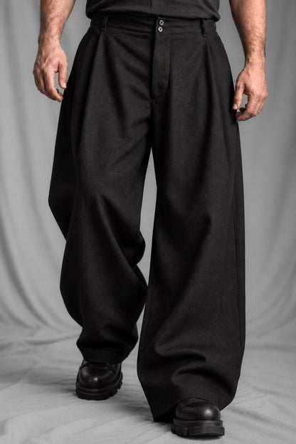 eigensinnig wien | Bandlkramer | Schwarze, weite Designerhose mit Bundfalten aus italienischer Wolle