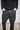 eigensinnig wien | Bentham | Schmale Hose mit tiefem Schritt aus beschichteter Baumwolle in schwarz