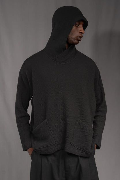 eigensinnig wien | Breed | Exklusiver Strickhoodie aus Merinowolle in Schwarz