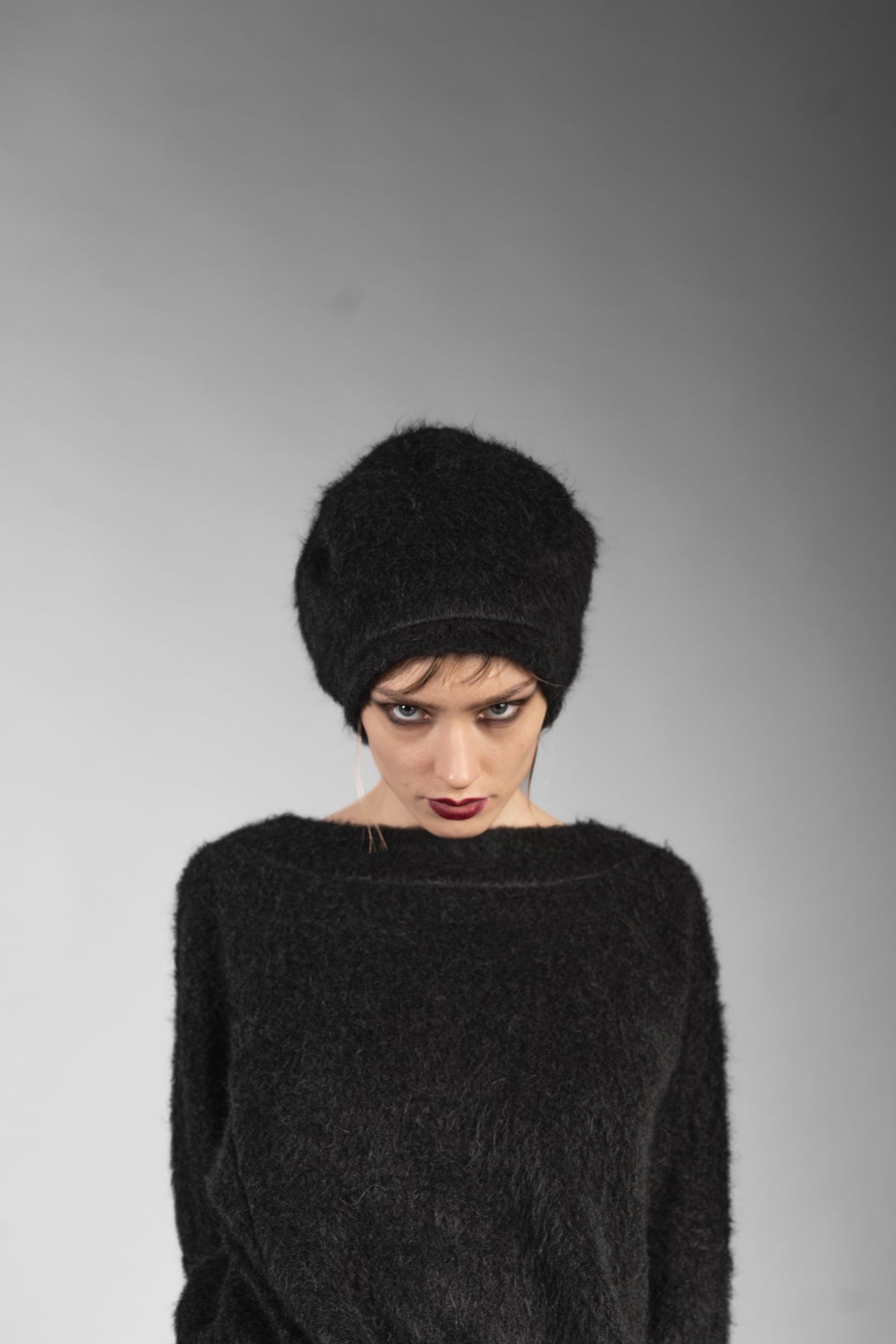 eigensinnig wien | Brontes | Schwarze Designer Ballonmütze aus warmen Baumwoll-Alpaca-Stoff