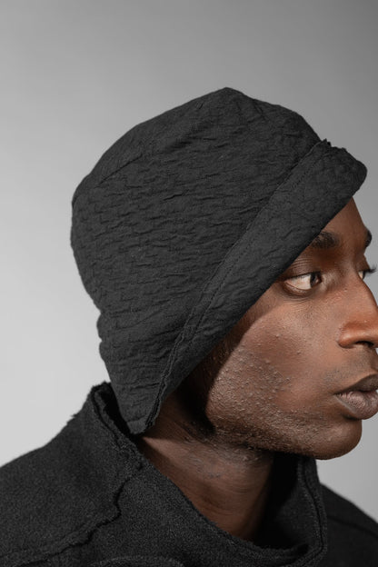 eigensinnig wien | Chaplin | Schwarzer Winter Bucket Hat für Herren und Damen aus Merinowolle