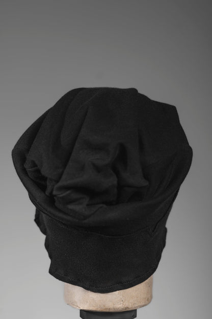 eigensinnig wien | Ehrenfels | Außergewöhnlicher schwarzer Designer-Beanie aus Baumwolle