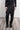 eigensinnig wien | Epikur | Ungewöhnliche Herren Bundfaltenhose mit tiefem Schritt aus Leinen in schwarz