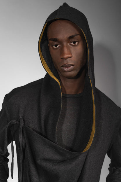 eigensinnig wien | Kalunga | Langer, ärmelloser Cardigan mit Kapuze in Schwarz