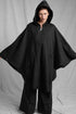 eigensinnig wien | Persephone | Schwarzer Hooded Designer-Poncho aus japanischem Luxusstoff