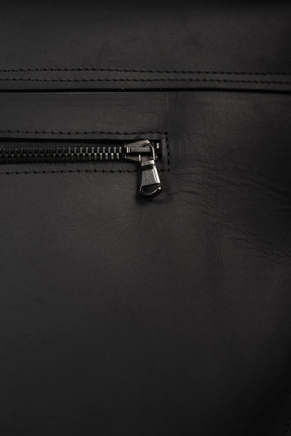 eigensinnig wien | Wellen | Schwarze Designer Ledertasche mit außergewöhnlichem Details