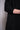 Forme d'Expression | DM129 Concaved Hem Knit Dress | Weites Strickkleid aus Schurwolle mit asymmetrischem Saum und wärmenden Kragen in schwarz