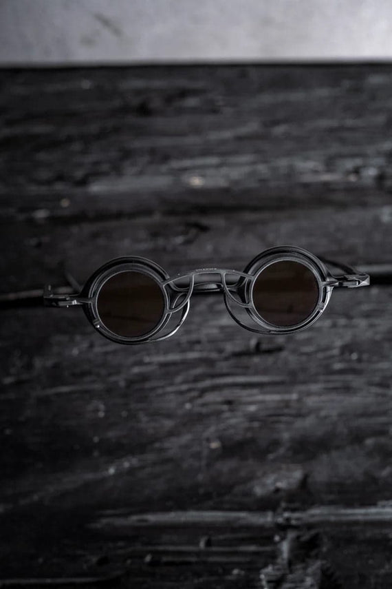 Rigards | RG0105TI | Unkonventionelle runde Sonnenbrille mit Clip On für Damen und Herren in schwarz